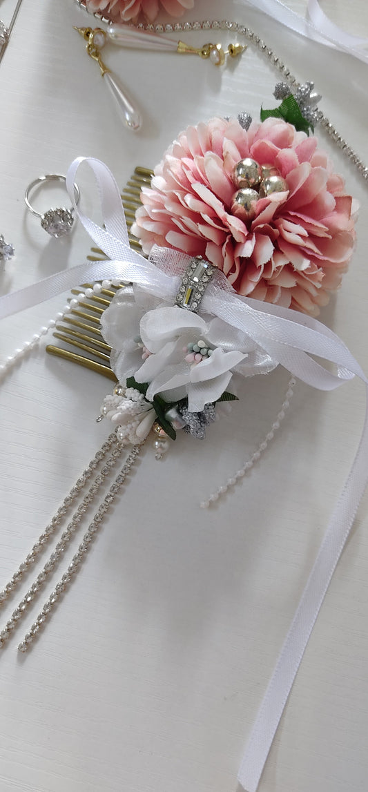 Bridal hair accessories with flowers and ribbons on a white background