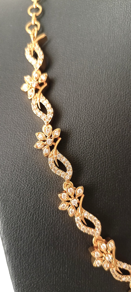 Enchanting Floral Twist Gold-Plated Necklace Set with Coordinated Drop Earrings