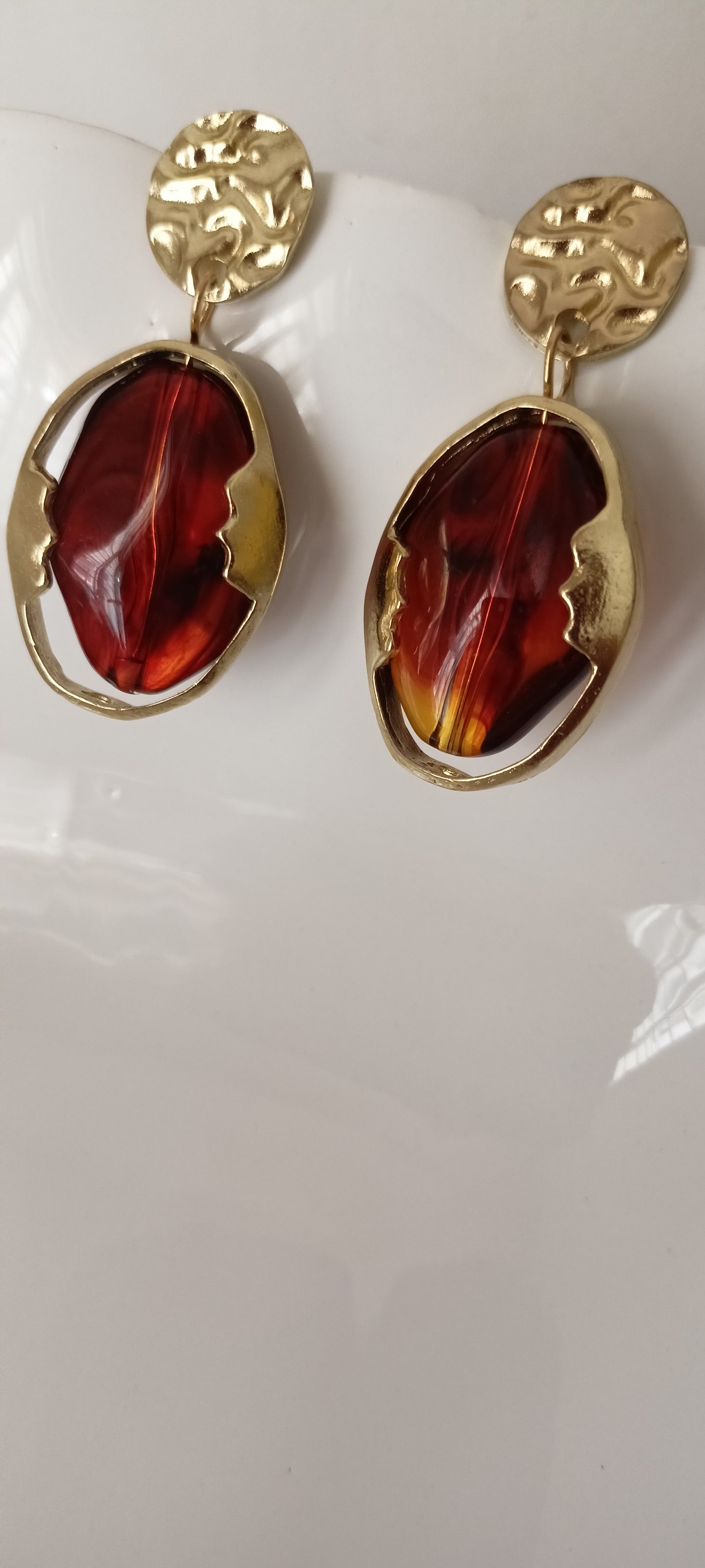Artistic Profile Gold Drop Earrings with Amber-Tone Acrylic