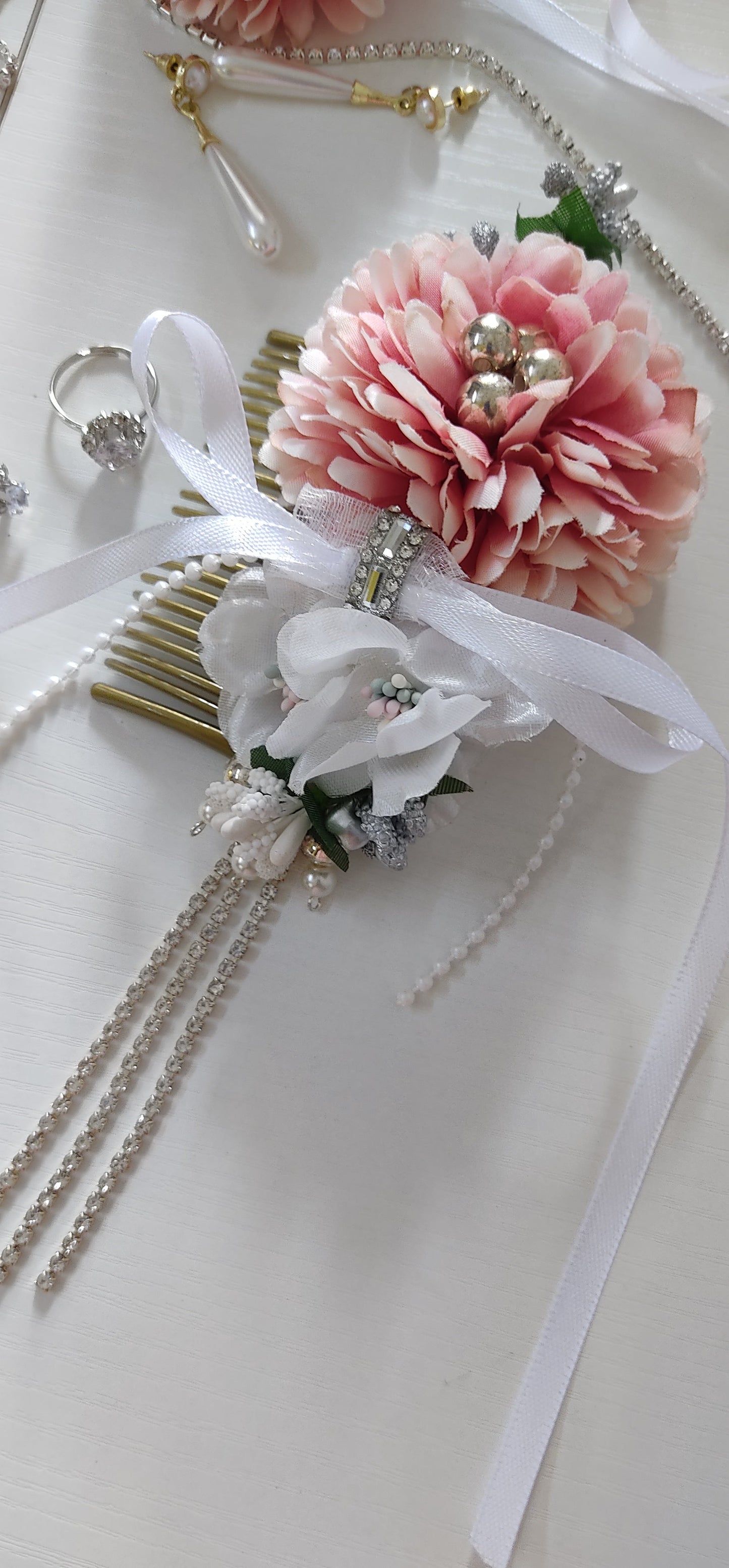 Bridal hair accessories with flowers and ribbons on a white background