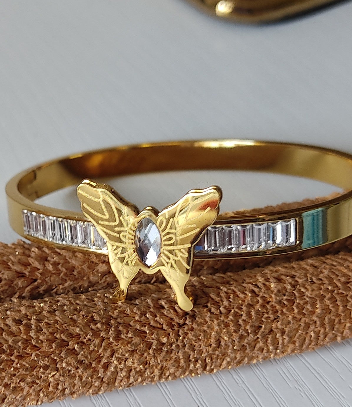 Butterfly Accent Gold-Plated Crystal Bangle Bracelet