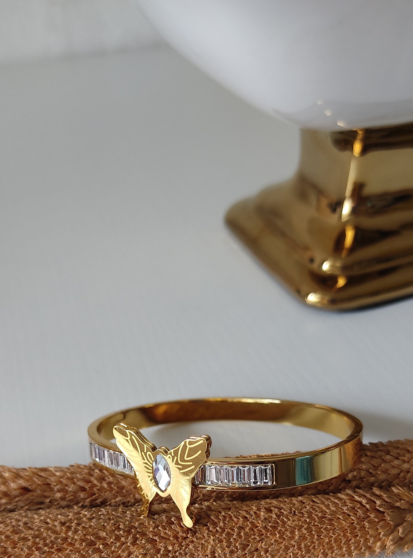 Butterfly Accent Gold-Plated Crystal Bangle Bracelet