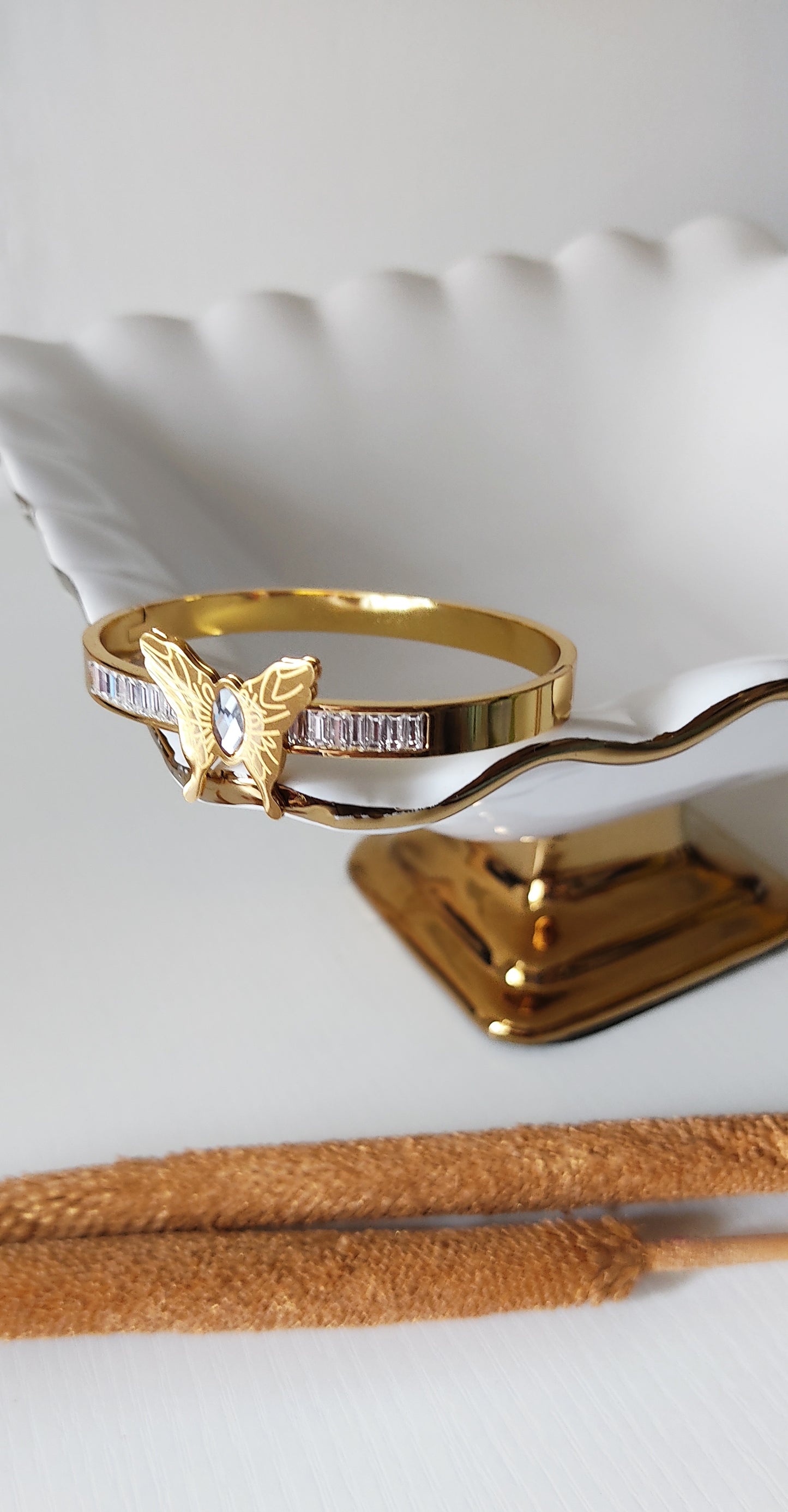 Butterfly Accent Gold-Plated Crystal Bangle Bracelet