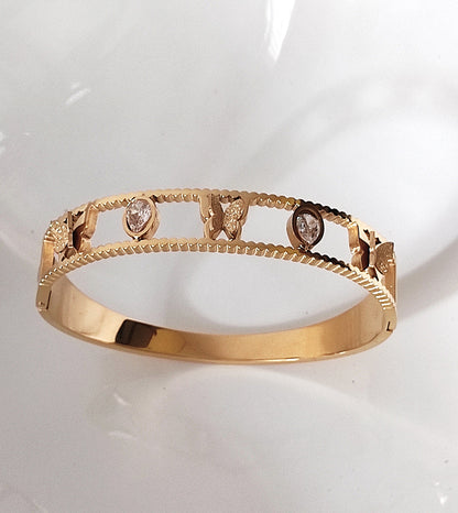 Butterfly Motif Gold-Plated Open Bangle Bracelet – Elegant Crystal Accents