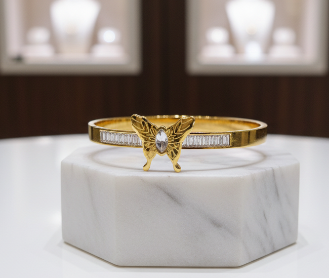 Butterfly Accent Gold-Plated Crystal Bangle Bracelet