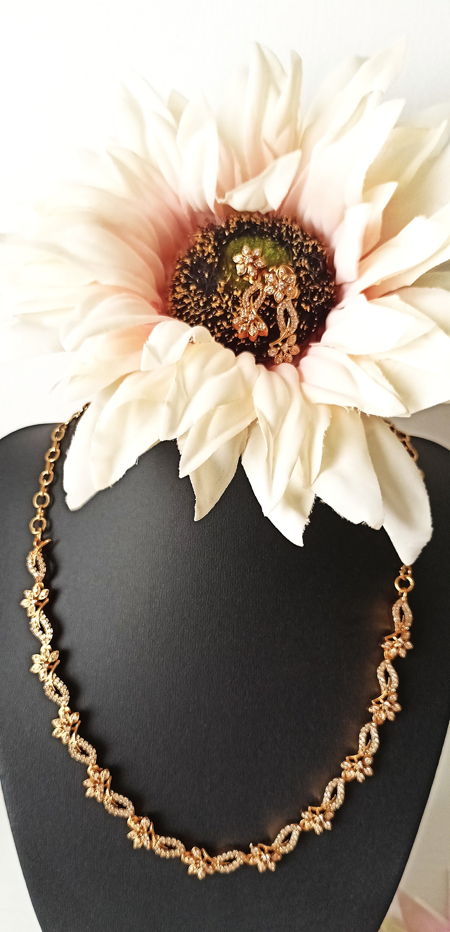 Enchanting Floral Twist Gold-Plated Necklace Set with Coordinated Drop Earrings
