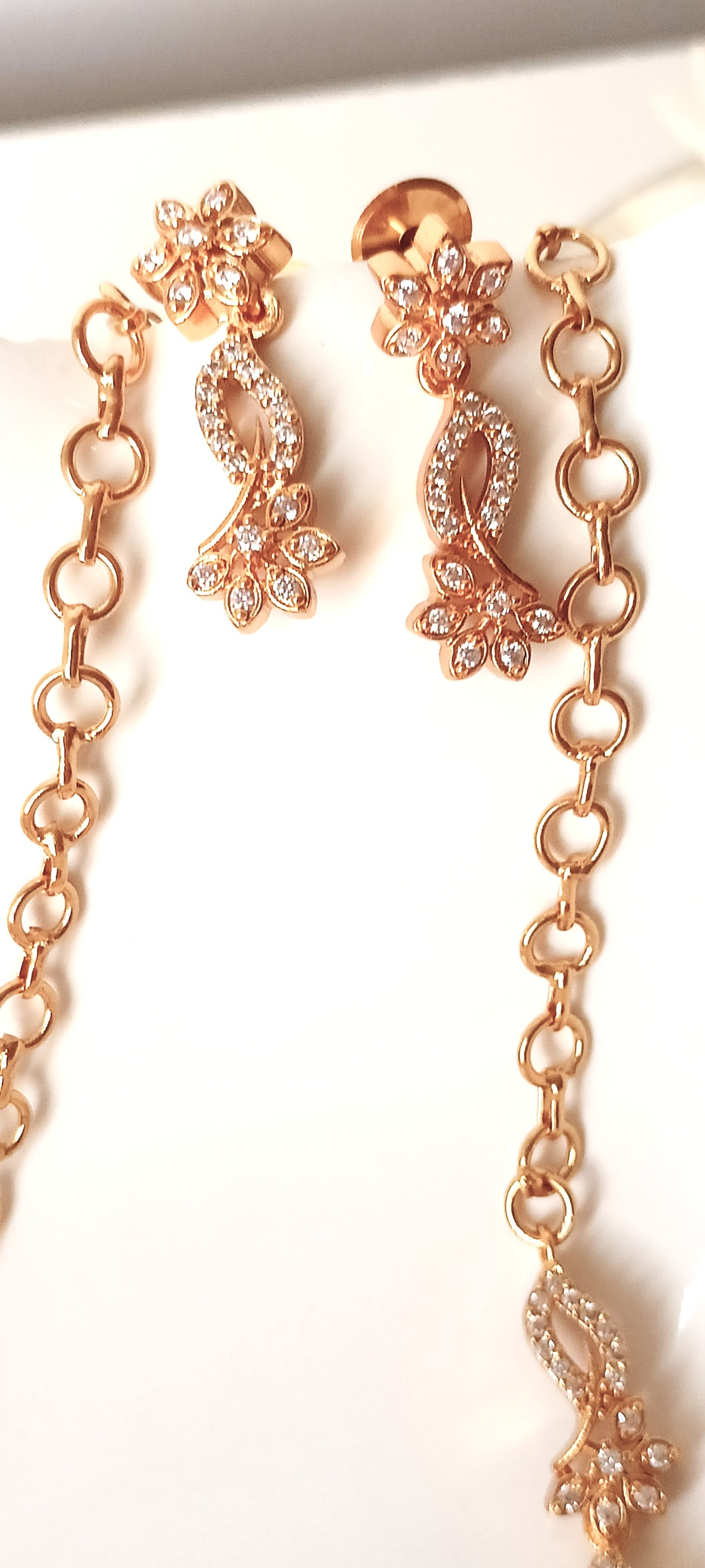 Enchanting Floral Twist Gold-Plated Necklace Set with Coordinated Drop Earrings
