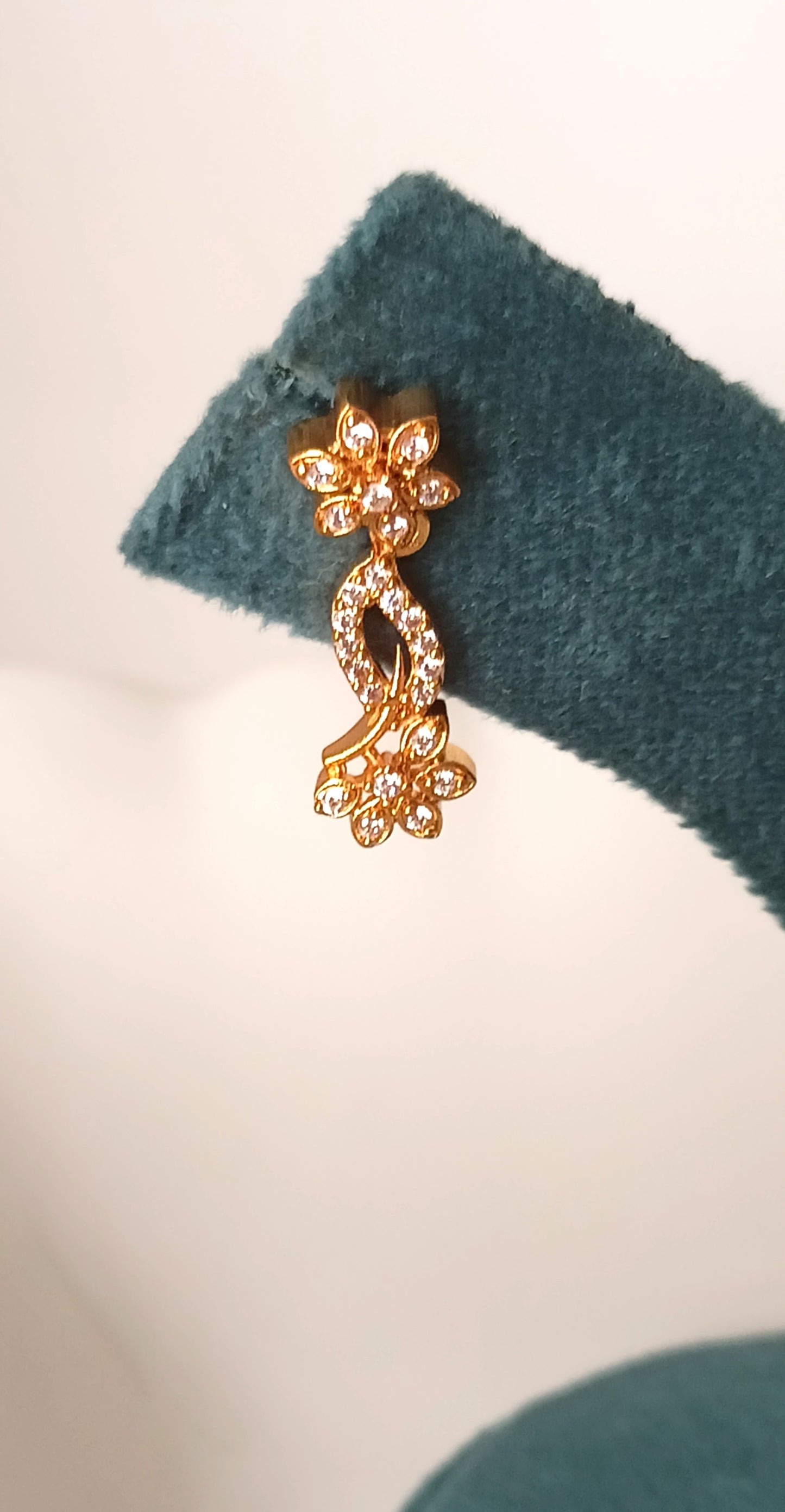 Enchanting Floral Twist Gold-Plated Necklace Set with Coordinated Drop Earrings
