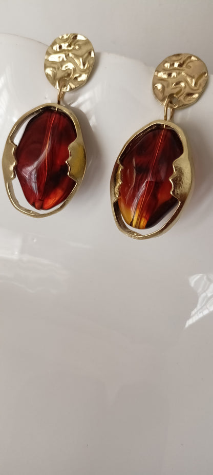 Artistic Profile Gold Drop Earrings with Amber-Tone Acrylic