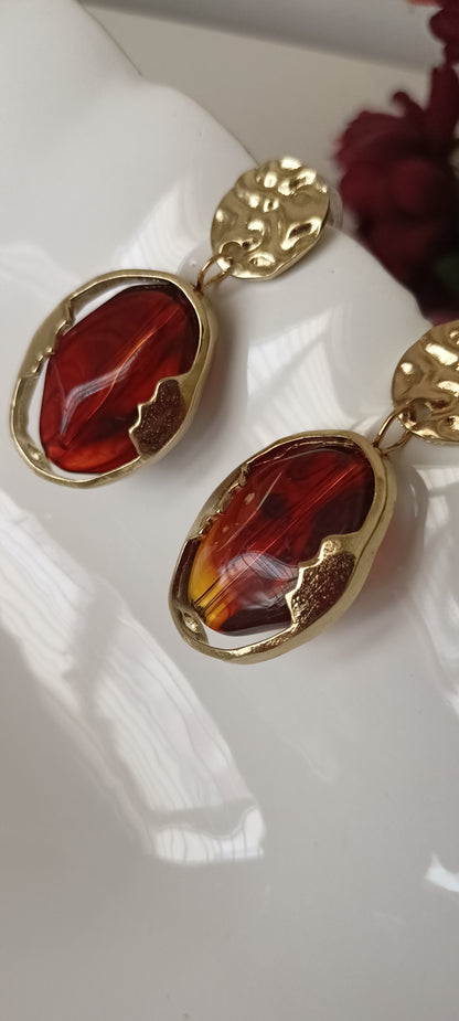 Artistic Profile Gold Drop Earrings with Amber-Tone Acrylic
