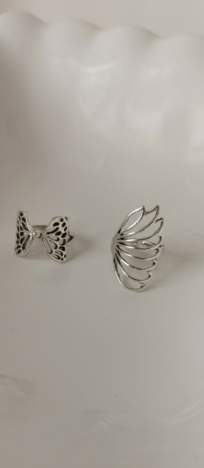 Pair of silver earrings on a white background