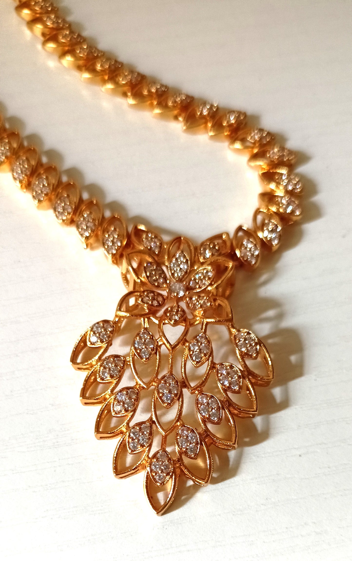 Radiant Floral Cascade Gold-Plated Necklace Set with Matching Earrings