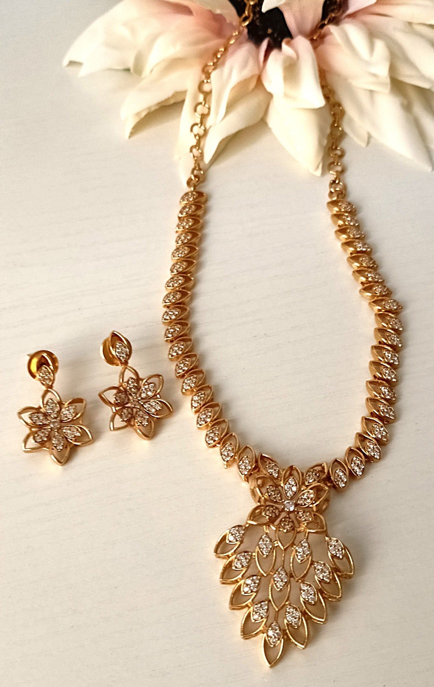Radiant Floral Cascade Gold-Plated Necklace Set with Matching Earrings